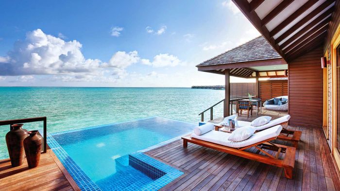 Overwater maldives bungalows villas hotels fushi huvafen luxury resorts resort pool ocean room modern house interior island private overlooking master